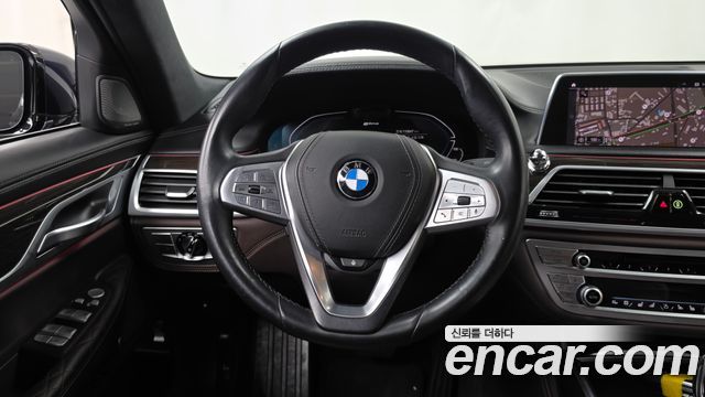BMW 7 Series (G11) 745e iPerformance Design Pure Excellence 2020 — фото 17
