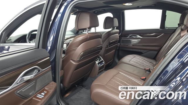 BMW 7 Series (G11) 745e iPerformance Design Pure Excellence 2020 — фото 32