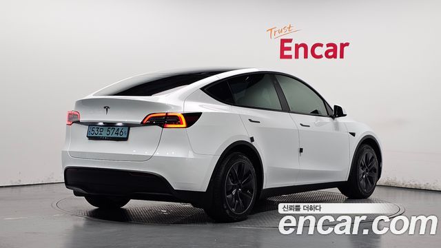 Tesla Model Y RWD 2023 — фото 2