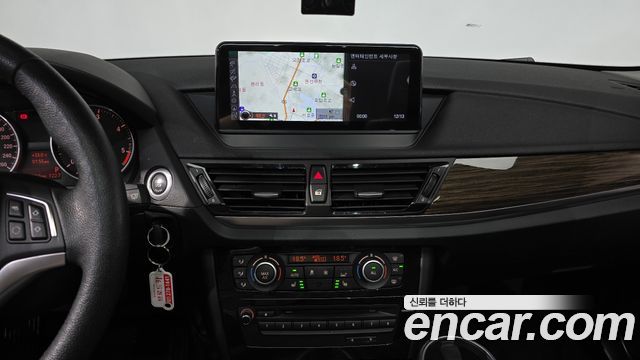 BMW X1 (E84) xDrive 18d 2015 — фото 13
