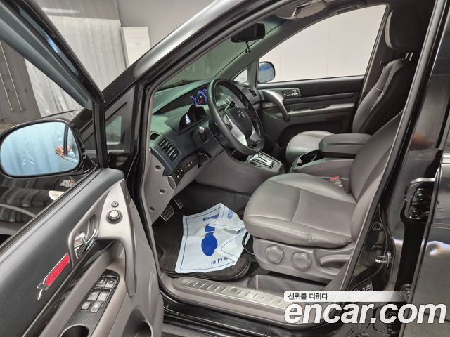 KG Mobility (SsangYong) Korando Turismo 4WD Extreme 9-seater 2015 — фото 15