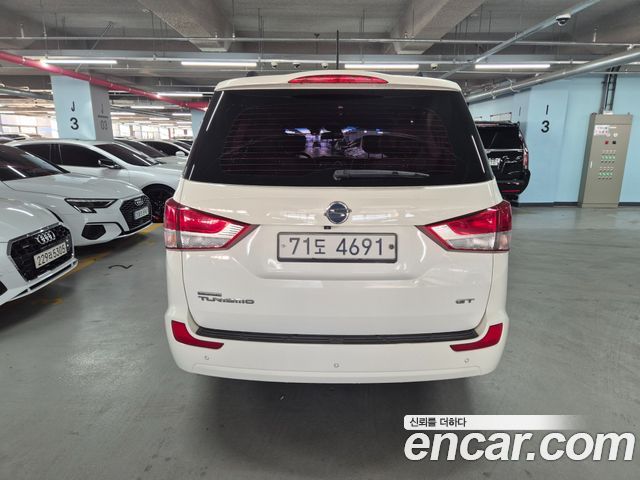 KG Mobility (SsangYong) Korando Turismo 4WD GT 11-seater 2014 — фото 6