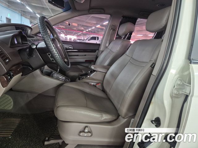 KG Mobility (SsangYong) Korando Turismo 4WD GT 11-seater 2014 — фото 8