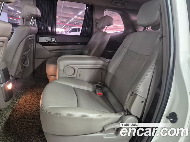 KG Mobility (SsangYong) Korando Turismo 4WD GT 11-seater 2014 — фото 10