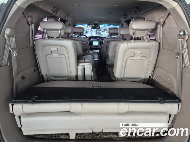 KG Mobility (SsangYong) Korando Turismo 4WD GT 11-seater 2014 — фото 15