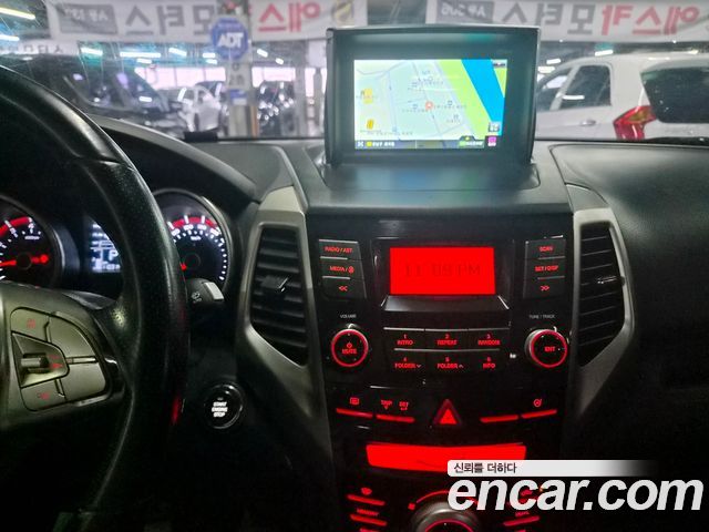KG Mobility (SsangYong) Tivoli VX 2WD 2015 — фото 9