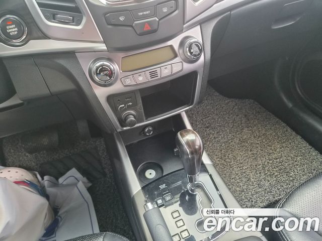 KG Mobility (SsangYong) Korando C 2.0 CVT 4WD Deluxe 2014 — фото 15
