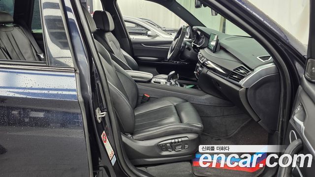 BMW X5 (F15) xDrive M50d 2014 — фото 11