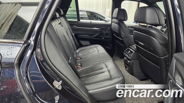 BMW X5 (F15) xDrive M50d 2014 — фото 12