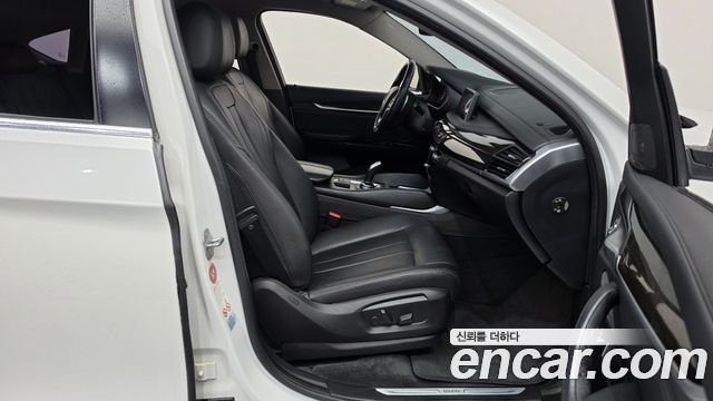 BMW X6 (F16) xDrive 30d 2015 — фото 11