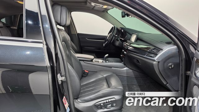 BMW X6 (F16) xDrive 40d 2016 — фото 11