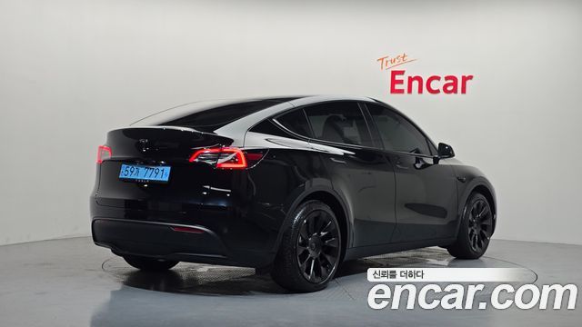 Tesla Model Y RWD 2023 — фото 2