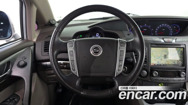 KG Mobility (SsangYong) Korando Turismo 2WD GT 11-seater 2014 — фото 13