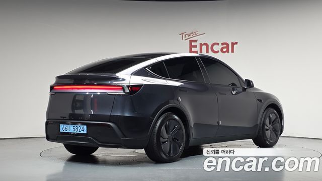Tesla Model Y RWD 2025 — фото 2