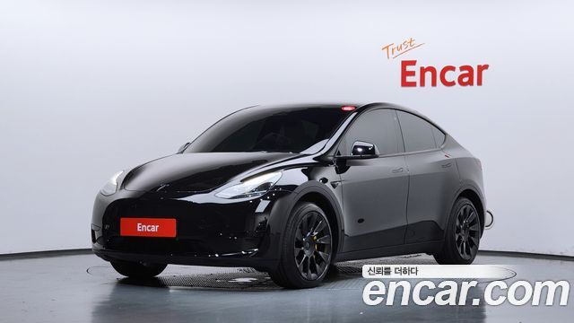Tesla Model Y RWD 2024 — фото 1
