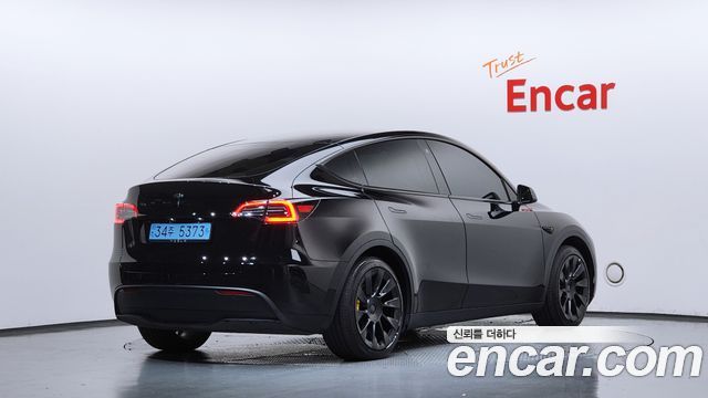 Tesla Model Y RWD 2024 — фото 2