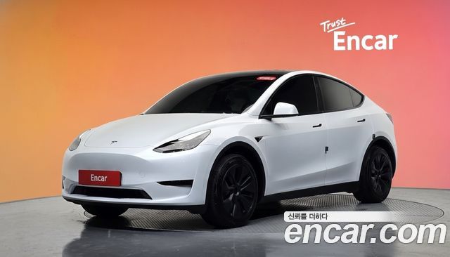 Tesla Model Y RWD 2024 — фото 1