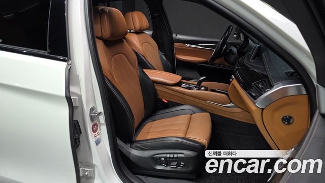 BMW X6 (F16) M50d 2017 — фото 11