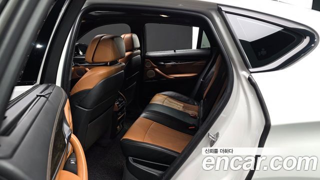 BMW X6 (F16) M50d 2017 — фото 12