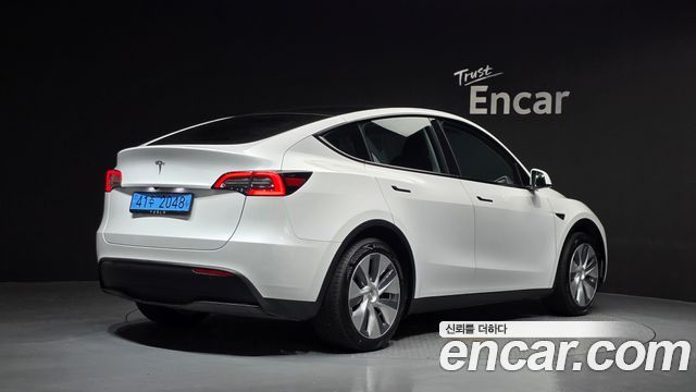 Tesla Model Y RWD 2024 — фото 2