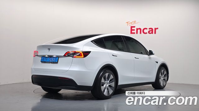 Tesla Model Y RWD 2023 — фото 2