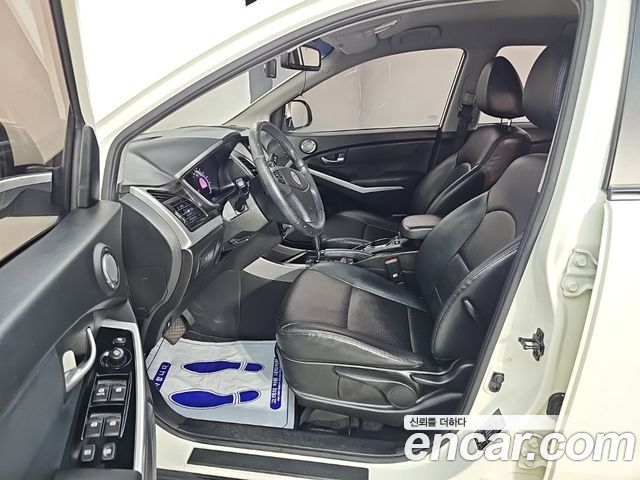 KG Mobility (SsangYong) Korando C 2.0 CVT 2WD Deluxe 2014 — фото 15