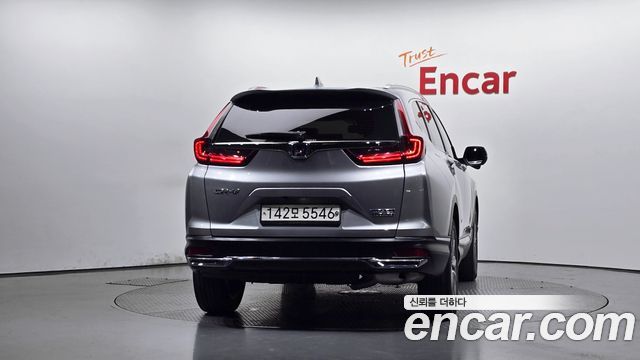 Honda CR-V (V) 2.0 Hybrid Touring 4WD 2021 — фото 4