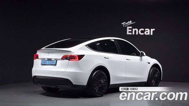 Tesla Model Y RWD 2024 — фото 2