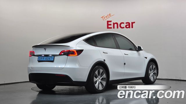Tesla Model Y RWD 2023 — фото 2