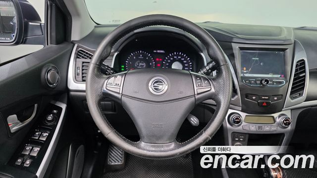 KG Mobility (SsangYong) Korando C 2.0 CVT 2WD Deluxe 2014 — фото 13