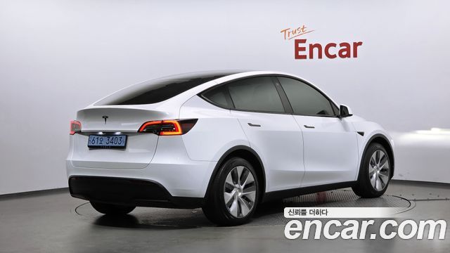 Tesla Model Y RWD 2024 — фото 2