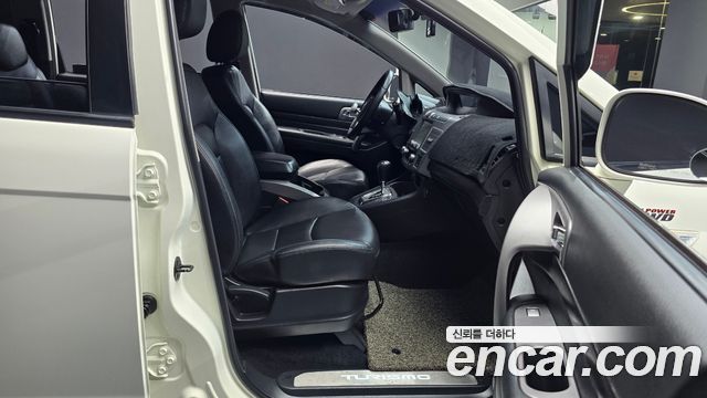 KG Mobility (SsangYong) Korando Turismo 4WD RX 9-seater 2017 — фото 15