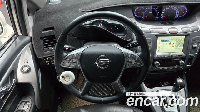 KG Mobility (SsangYong) Korando Turismo 4WD RX 9-seater 2017 — фото 17
