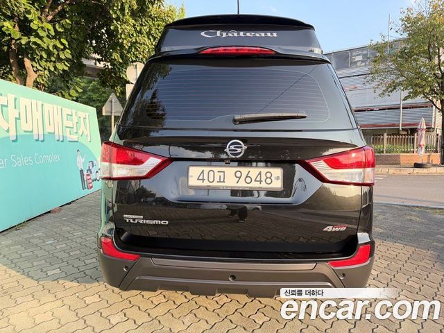 KG Mobility (SsangYong) Korando Turismo 4WD Chateau 9-seater 2014 — фото 3