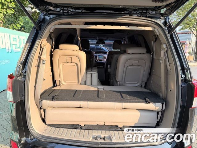KG Mobility (SsangYong) Korando Turismo 4WD Chateau 9-seater 2014 — фото 5
