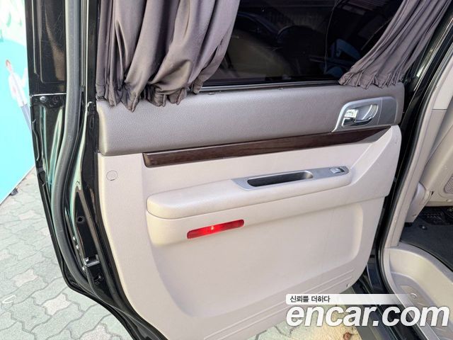 KG Mobility (SsangYong) Korando Turismo 4WD Chateau 9-seater 2014 — фото 6