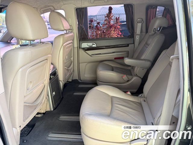 KG Mobility (SsangYong) Korando Turismo 4WD Chateau 9-seater 2014 — фото 7