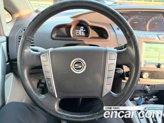 KG Mobility (SsangYong) Korando Turismo 4WD Chateau 9-seater 2014 — фото 18
