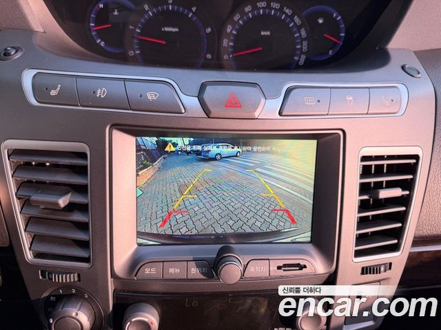 KG Mobility (SsangYong) Korando Turismo 4WD Chateau 9-seater 2014 — фото 21