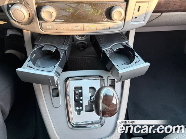 KG Mobility (SsangYong) Korando Turismo 4WD Chateau 9-seater 2014 — фото 22