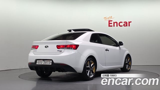 Kia Forte Koup 1.6 GDI Prestige 2013 — фото 2