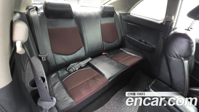 Kia Forte Koup 1.6 GDI Prestige 2013 — фото 18