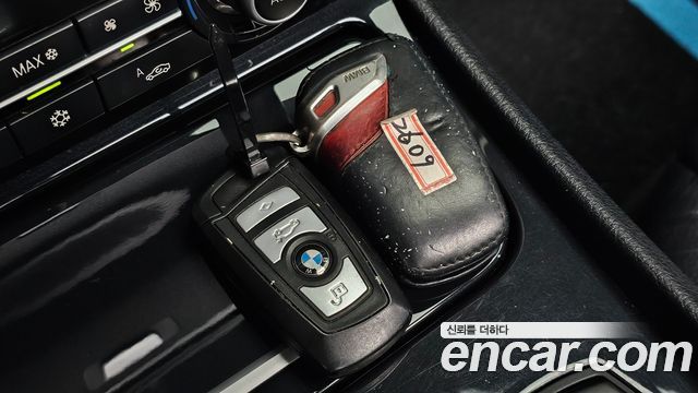 BMW 5 Series GT (F07) GT 30d 2012 — фото 19