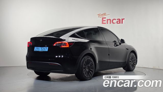 Tesla Model Y RWD 2024 — фото 2