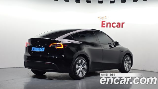 Tesla Model Y RWD 2024 — фото 2