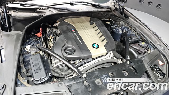 BMW 5 Series (F10) M550d xDrive 2014 — фото 6