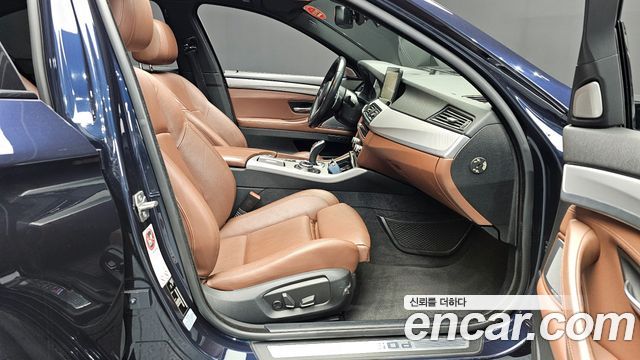 BMW 5 Series (F10) M550d xDrive 2014 — фото 11