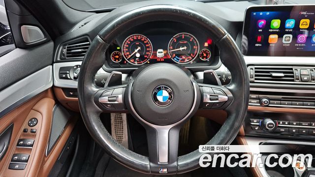 BMW 5 Series (F10) M550d xDrive 2014 — фото 13
