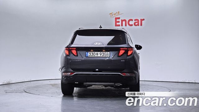 Hyundai Tucson (NX4) Gasoline 1.6 Turbo 4WD Premium 2021 — фото 4