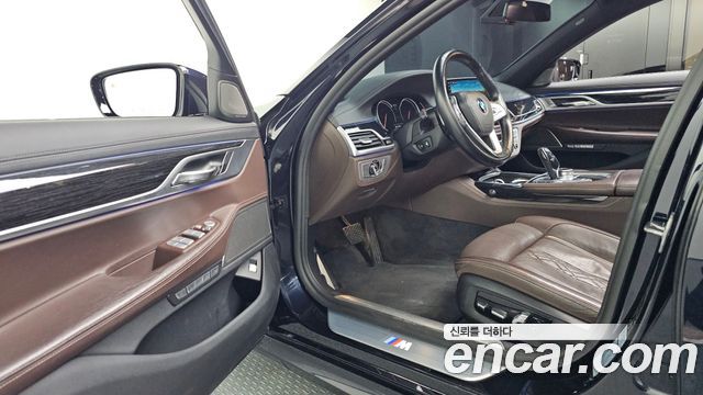 BMW 7 Series (G11) 740d xDrive M Sport 2017 — фото 10